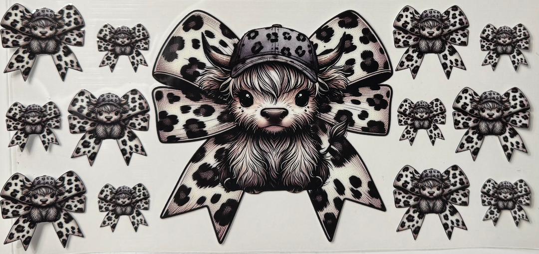 Grey highland cow w/ bow