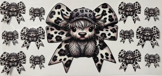 Grey highland cow w/ bow